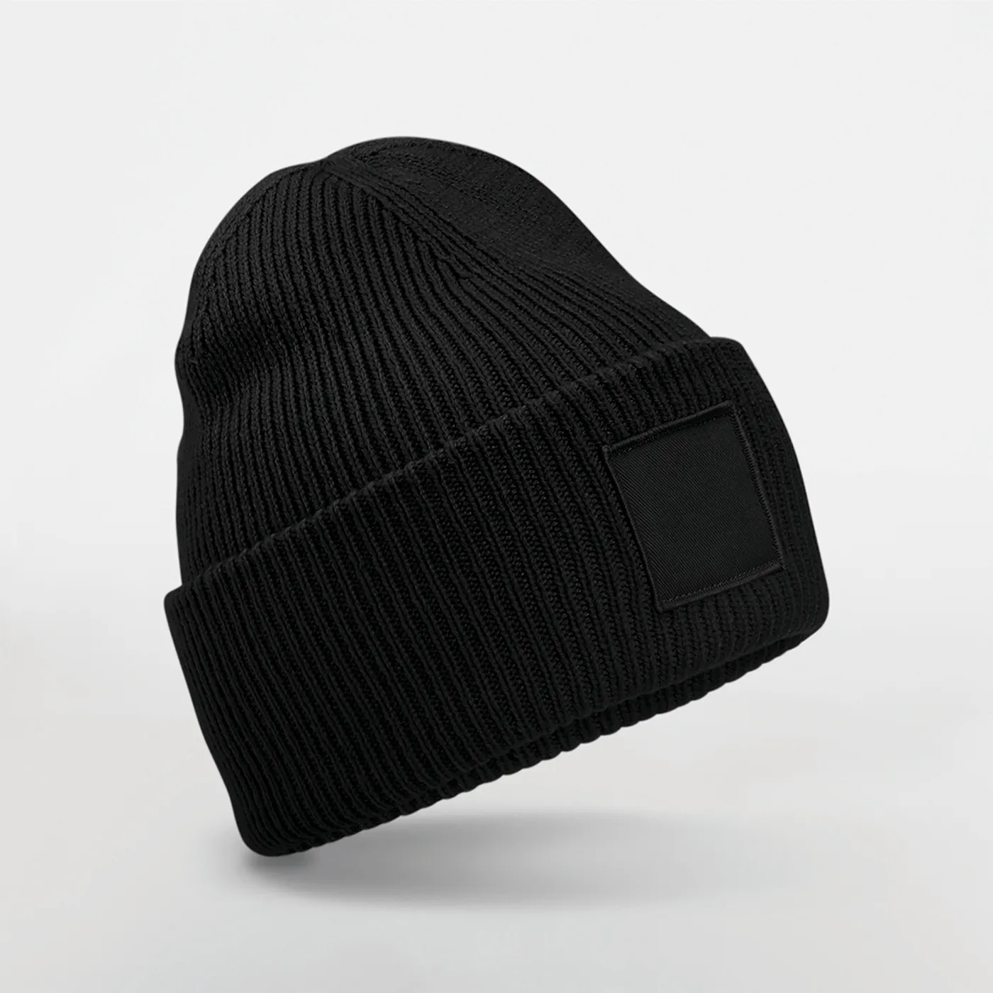 Bonnet à large revers avec patch ton sur ton