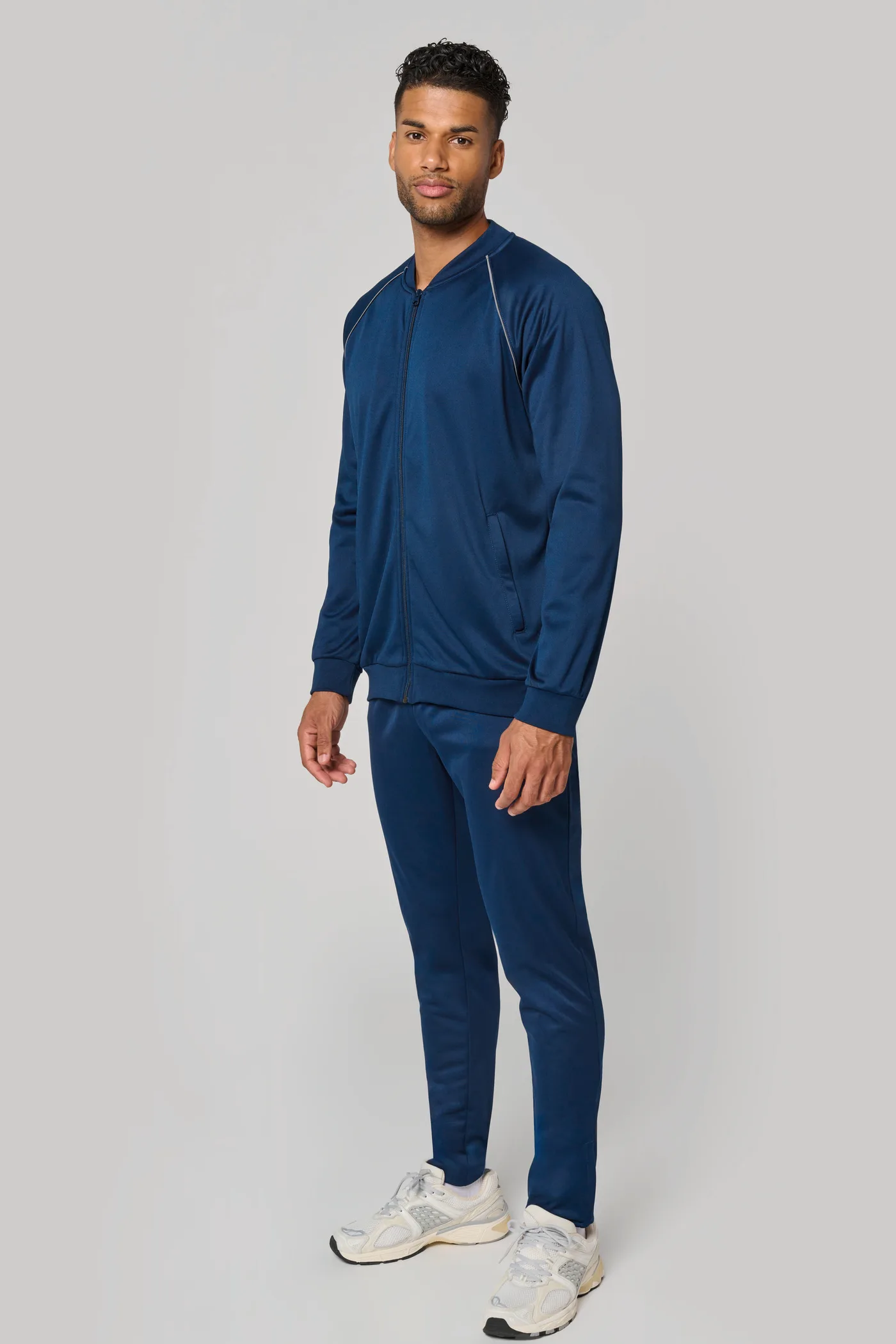 Unisex-Trainingsjacke mit Reißverschluss und Paspel