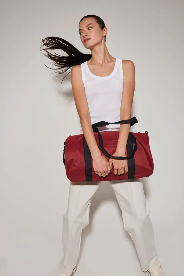 Recycelte Schlauchtasche mit Frontfach 6